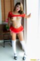 In doorway breasts exposed short skirt white knee high stockings black high heels