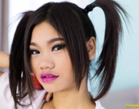 Bunni strips knotted shirt and short skirt and shows her shaved pussy