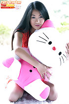 Clutching hello kitty to her chest